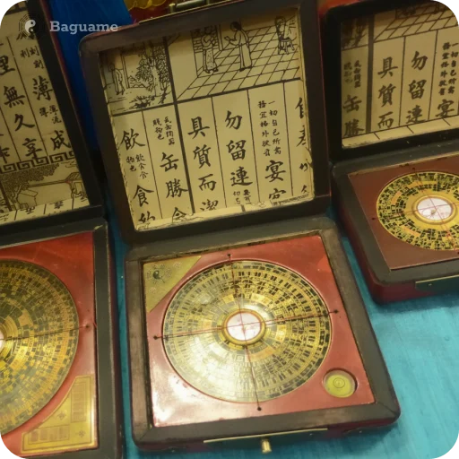 Golden Feng Shui Luo Pan compasses in red-lined wooden boxes with ancient Chinese texts for classical analysis.